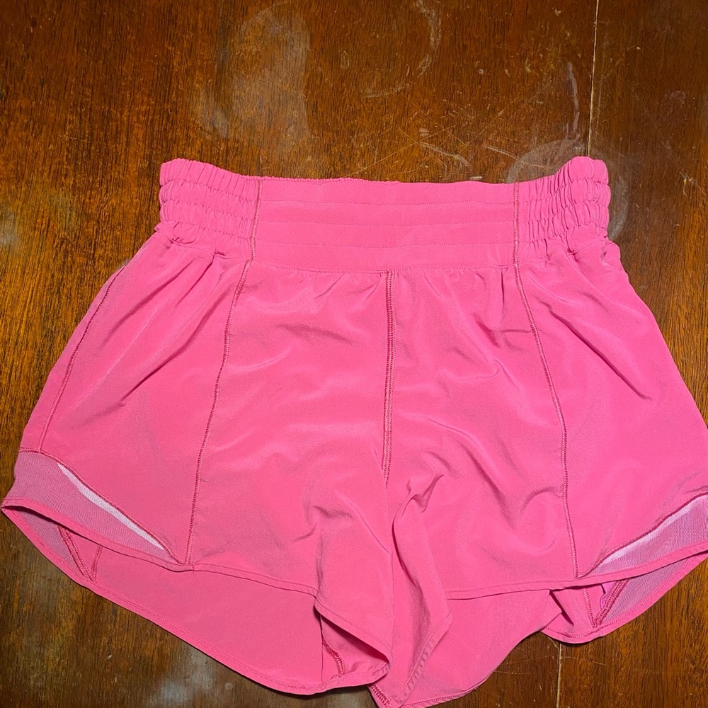Bright pink Size 6 Lululemon High Rise Hotty Hot Shorts. 4.5 inch inseam